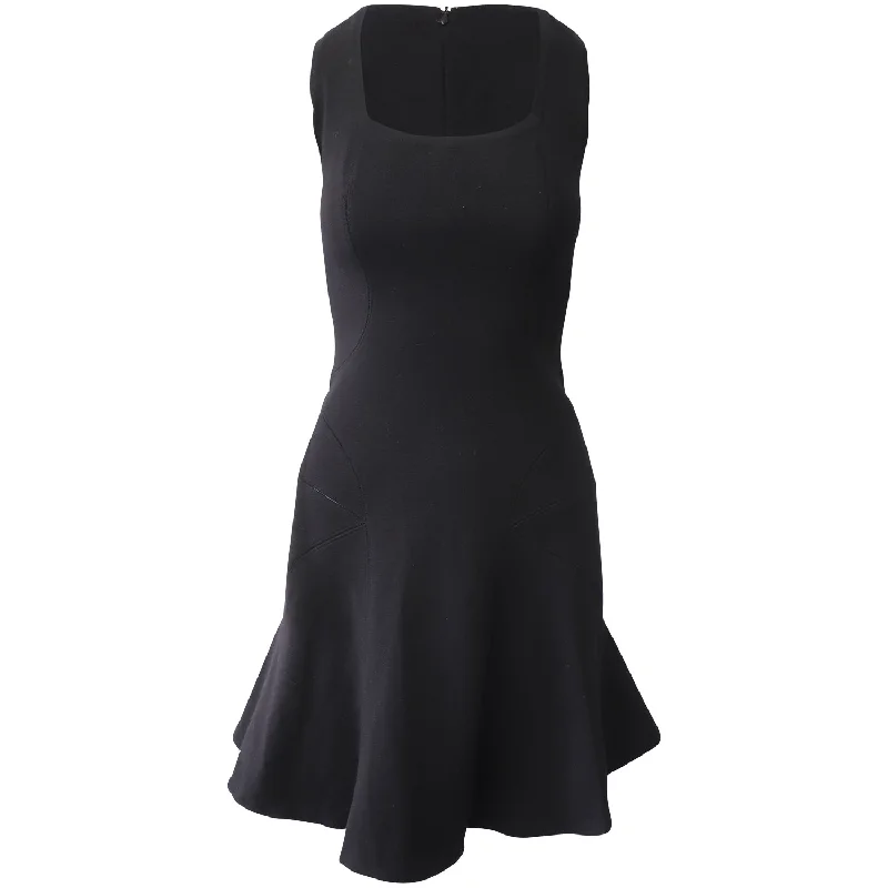 Alaia Sleeveless Fluted Mini Dress in Black Wool